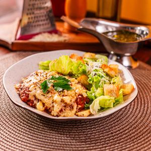 imagem do produto Parmegiana de Frango com Caesar Salad