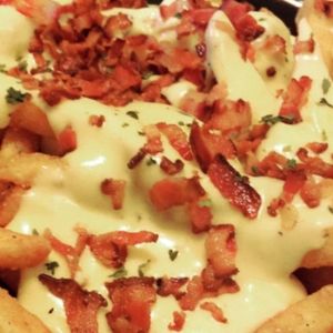 imagem do produto Batata com queijo e bacon M