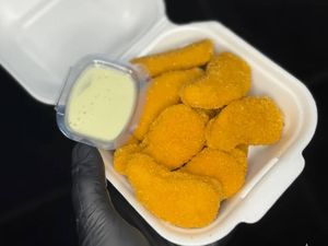 imagem do produto Porção de Nuggets + Molho Verde