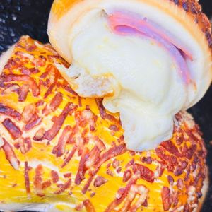 imagem do produto Enrolado de presunto e queijo assado