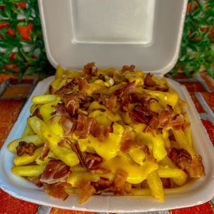 imagem do produto Batata frita + cheddar derretido + bacon crocante