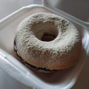 imagem do produto Donuts Recheado com Nutella e cobertura de leite em pó