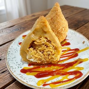 imagem do produto COXINHA DE FRANGO NA MASSA DE MACAXEIRA