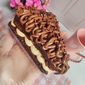 imagem do produto Fatia de brownie recheada ninho com Nutella 