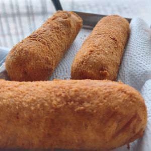 imagem do produto Enroladinho de queijo e presunto