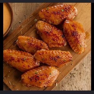 imagem do produto Porção 5 unidades de tulipas de frango (meio da asa)