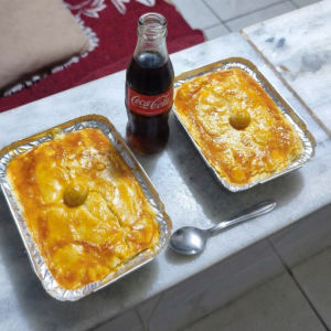 imagem do produto Empadão de frango cremoso+ 1 coca cola de garrafa