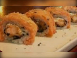 imagem do produto Uramaki Especial com Salmão em Cima 5 Und